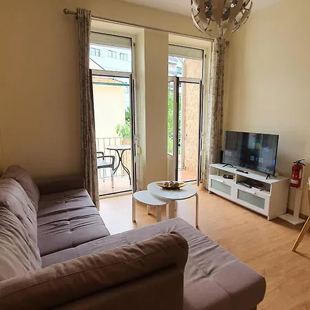 Downtown With Parking Next To Subway